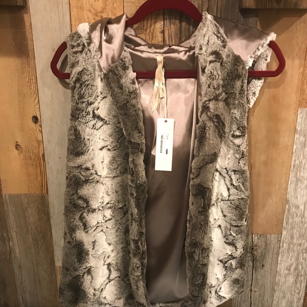 Hooded fur vest